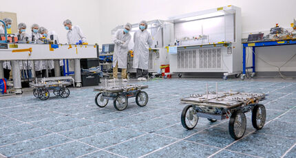Trio of CADRE rovers in action at JPL’s clean room.