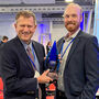 Semplastics CEO Bill Easter and Director of R&D Kyle Marcus with Voltage Award.