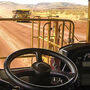 A view from inside the cab of an autonomous Cat mining truck.