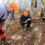 Crew inspects the ground for mineralization at MacDonald Mines SPJ Gold project.