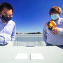 Xuilin Ruan (left) and Joseph Peoples (right) measure their whitest paint.