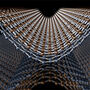 A rendering of carbon-like atoms overlaid like a grid, representing graphene.