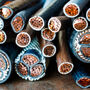 A view of the ends of various-sized copper cables for electrical transmission.