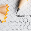 Image of hexagonal graphene lattice drawn on graph paper with graphite pencil.