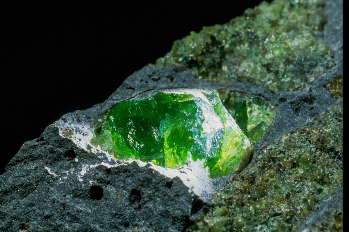 Closeup%20of%20a%20green%20forsterite%20crystal%2C%20an%20olivine%20mineral%2E