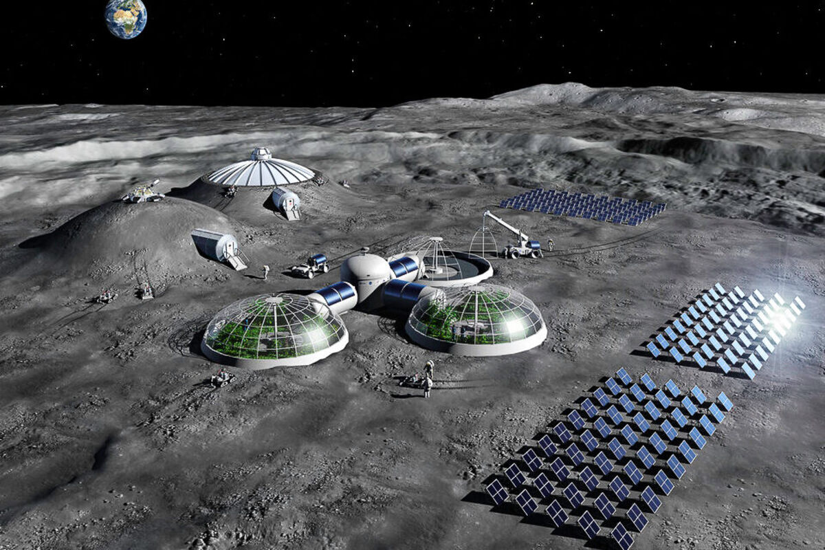 Artist’s concept of a moon base with solar panels and biodomes.