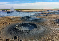 Mud pots from geothermal waters bubbling to the surface on the Salton Sea shore.