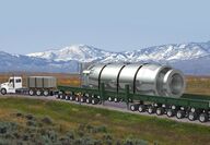 Truck hauls small nuclear reactor module SMR for delivery to electric plant site