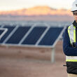Teck miner at solar power generating facility Chilean mine