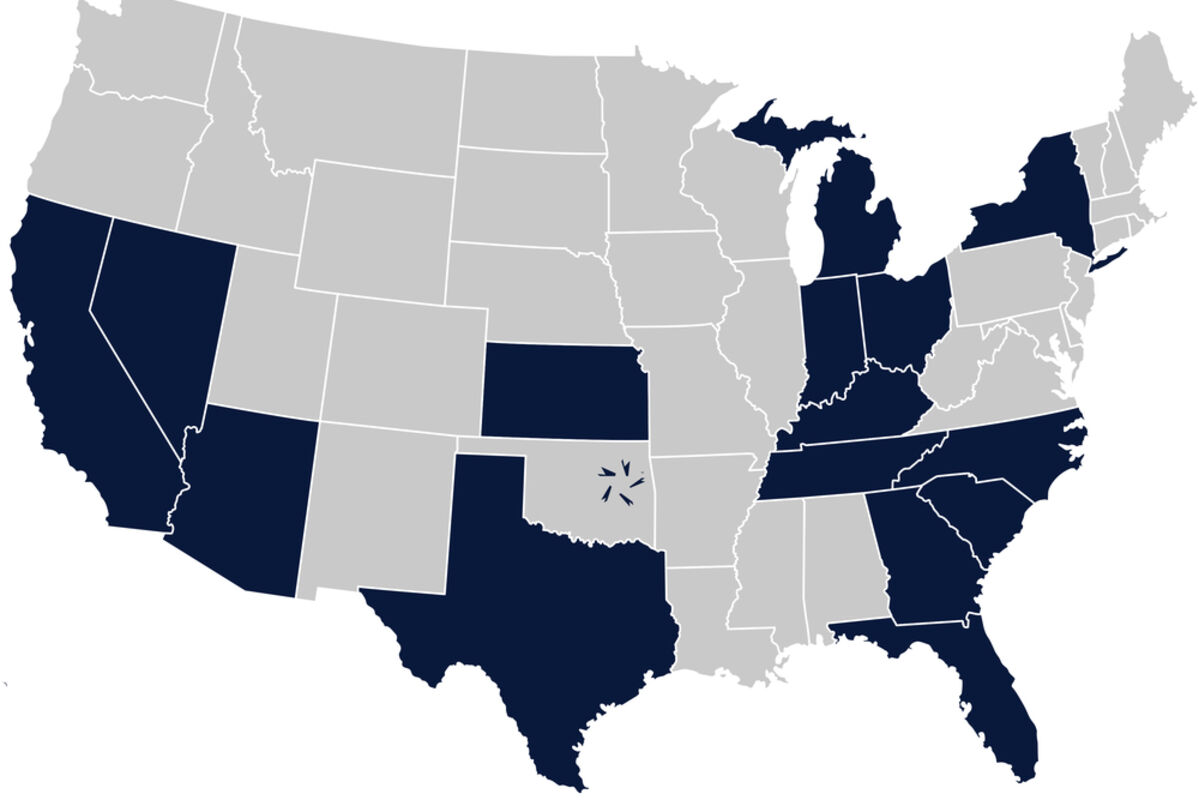 U.S. map with states hosting battery gigafactories colored blue.