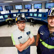 Two CONSOL Energy employees standing in an operations room.