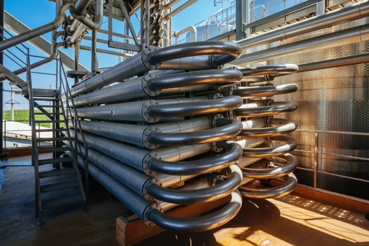 An industrial-sized coaxial-type corrugated tube heat exchanger.
