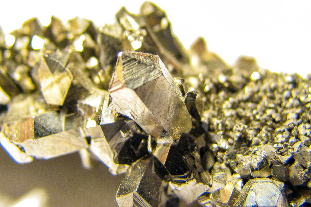 A raw crystal of niobium is light gray, crystalline, yet very ductile.