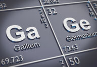 Closeup of the gallium and germanium entries on the periodic table of elements.