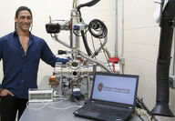University of Wisconsin student with electron beam powder imaging equipment.