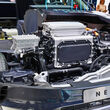 A Hyundai NEXO cut through the middle, showing its hydrogen fuel-powered engine.