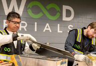 Redwood employees dismantling end-of-life EV batteries.