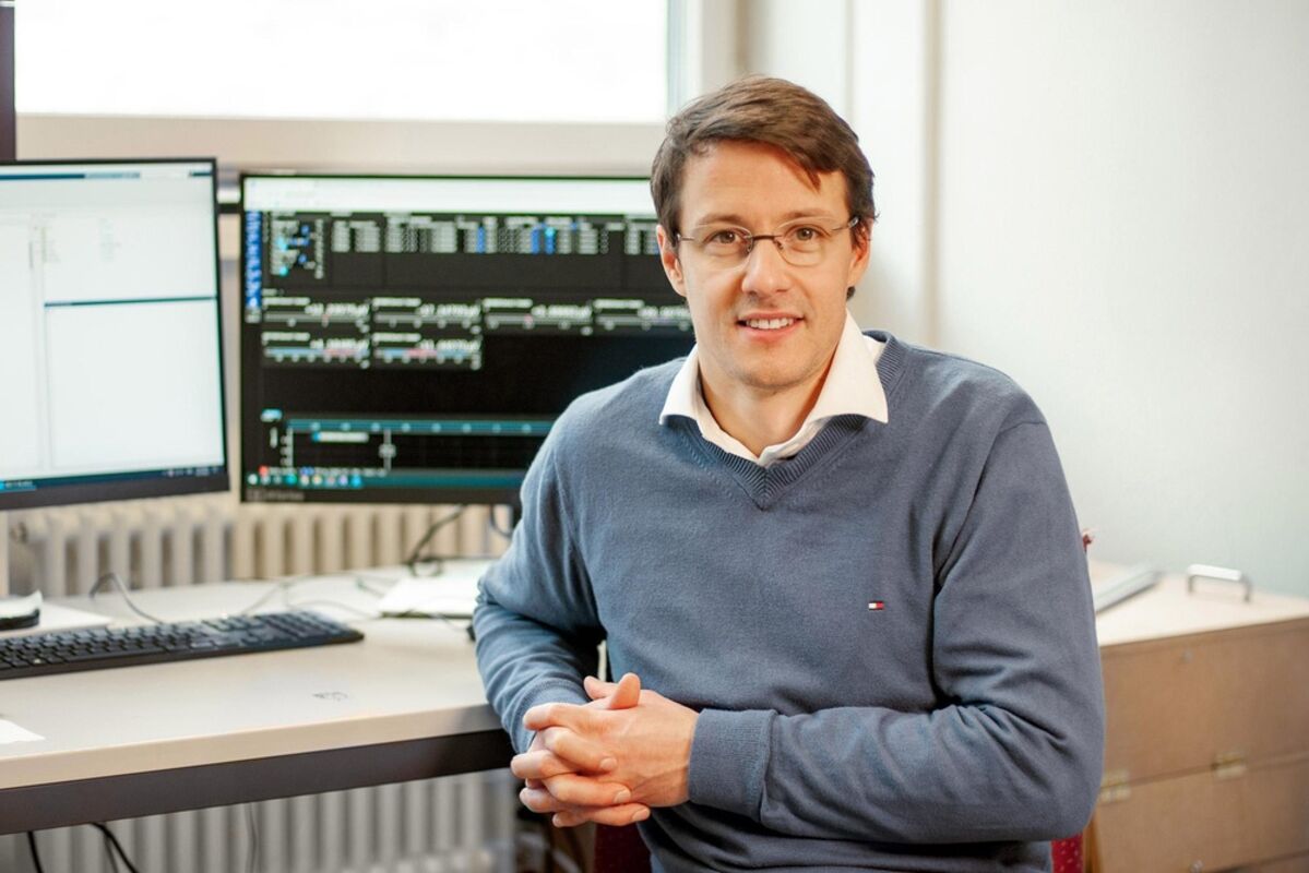 Quantum physicist Mickael Perrin at his computer.