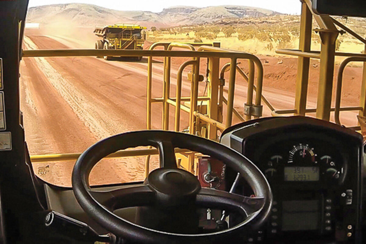 A%20view%20from%20inside%20the%20cab%20of%20an%20autonomous%20Cat%20mining%20truck%2E