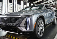Silver Cadillac Lyriq EV rolls off a General Motors assembly line in Tennessee.