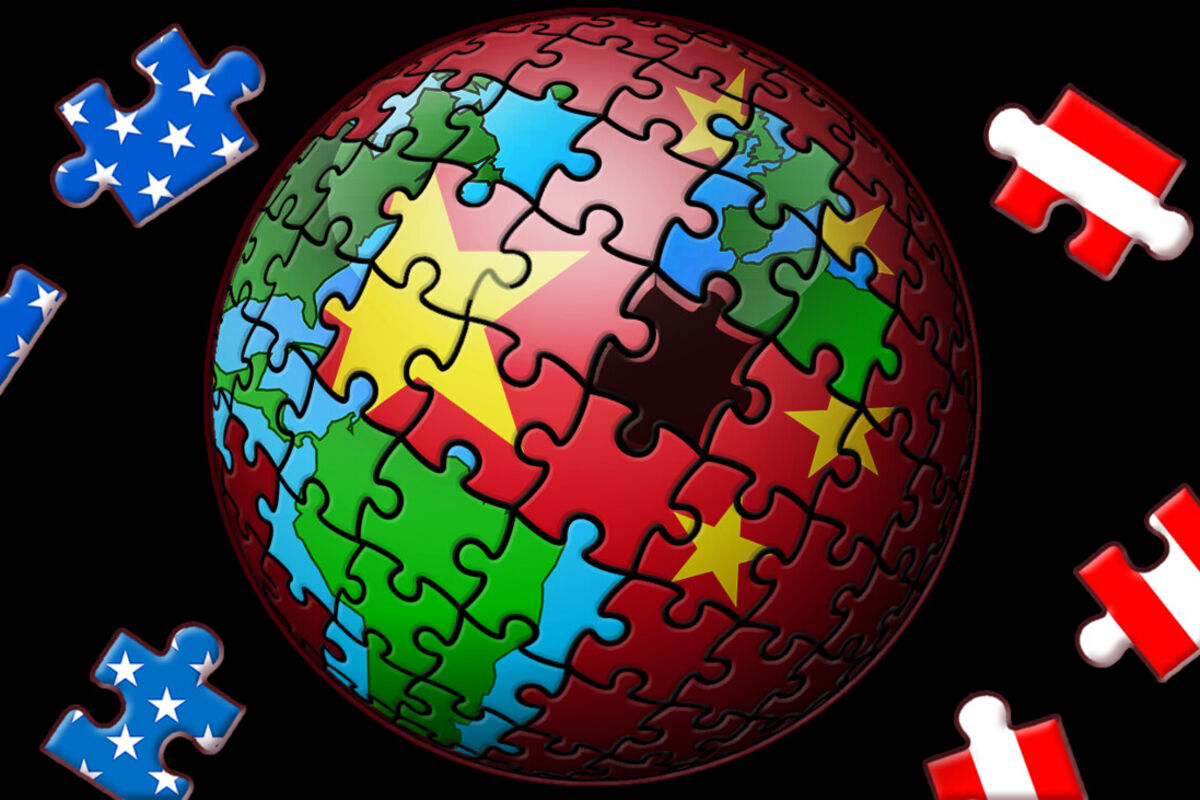 Puzzle%20pieces%20of%20Chinese%20and%20U%2ES%2E%20flags%20over%20a%20globe%2E
