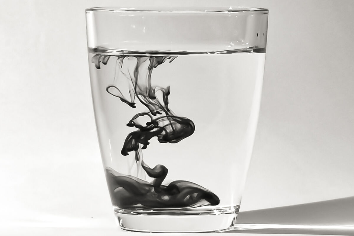 Black graphene ink in glass of water Zen virucidal formula
