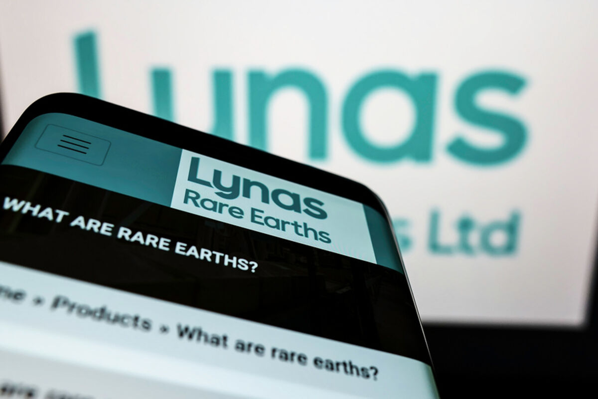“What are Rare Earths?” and Lynas logo on a smartphone screen.