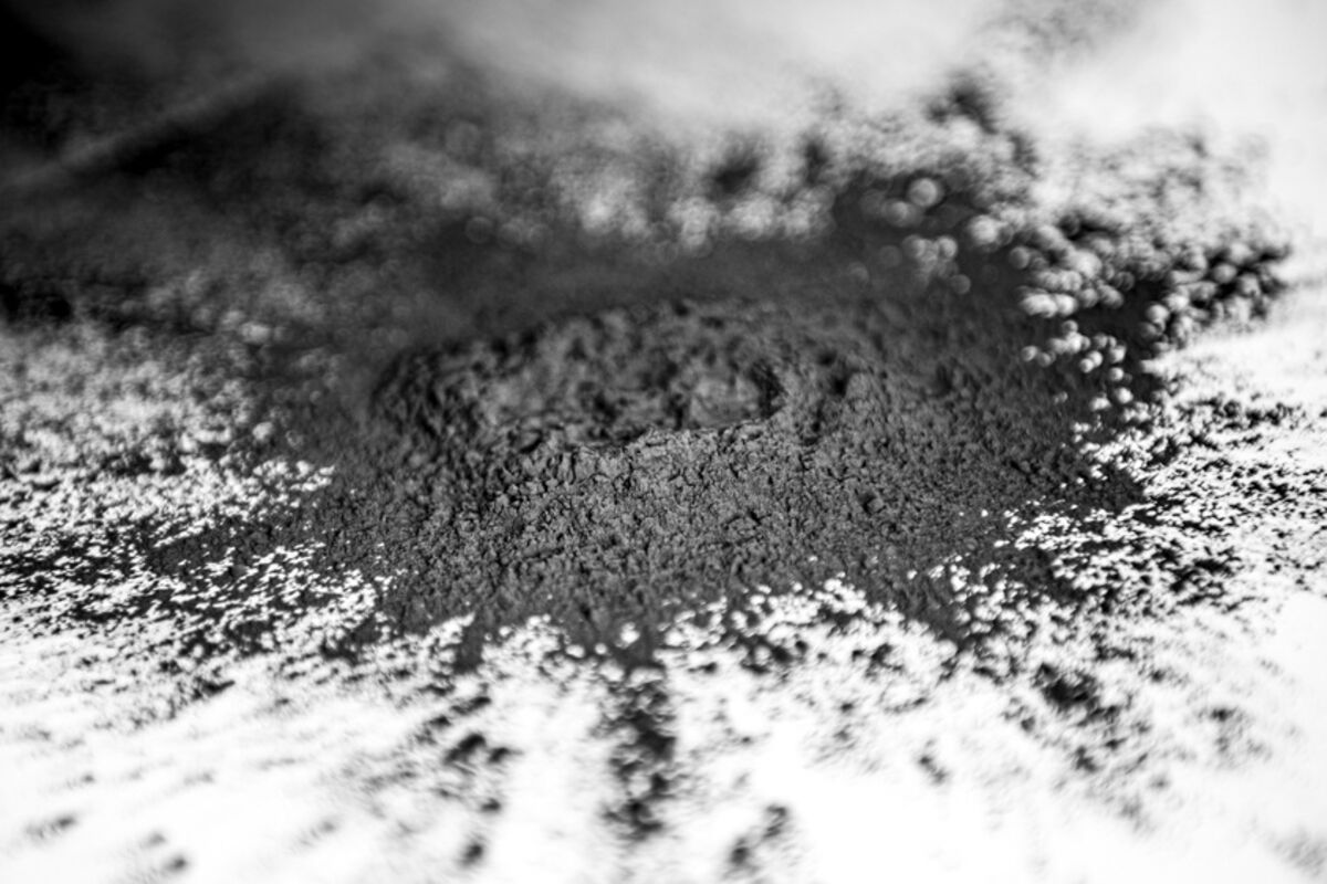 A splattered mound of finely powdered recycled battery.