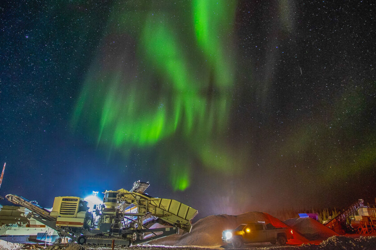 Green northern lights over a crusher at the Nechalacho rare earth mine.