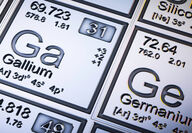 Metallic-looking tiles for gallium and germanium on the periodic table.