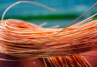 Closeup of a bundle of copper wire strands.