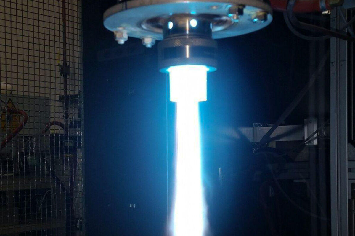 A focused spout of bright blue plasma that looks like flame.