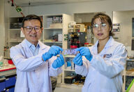 Professor Lim Chwee Teck and Dr Chen Shuwen holding BiLiSC.