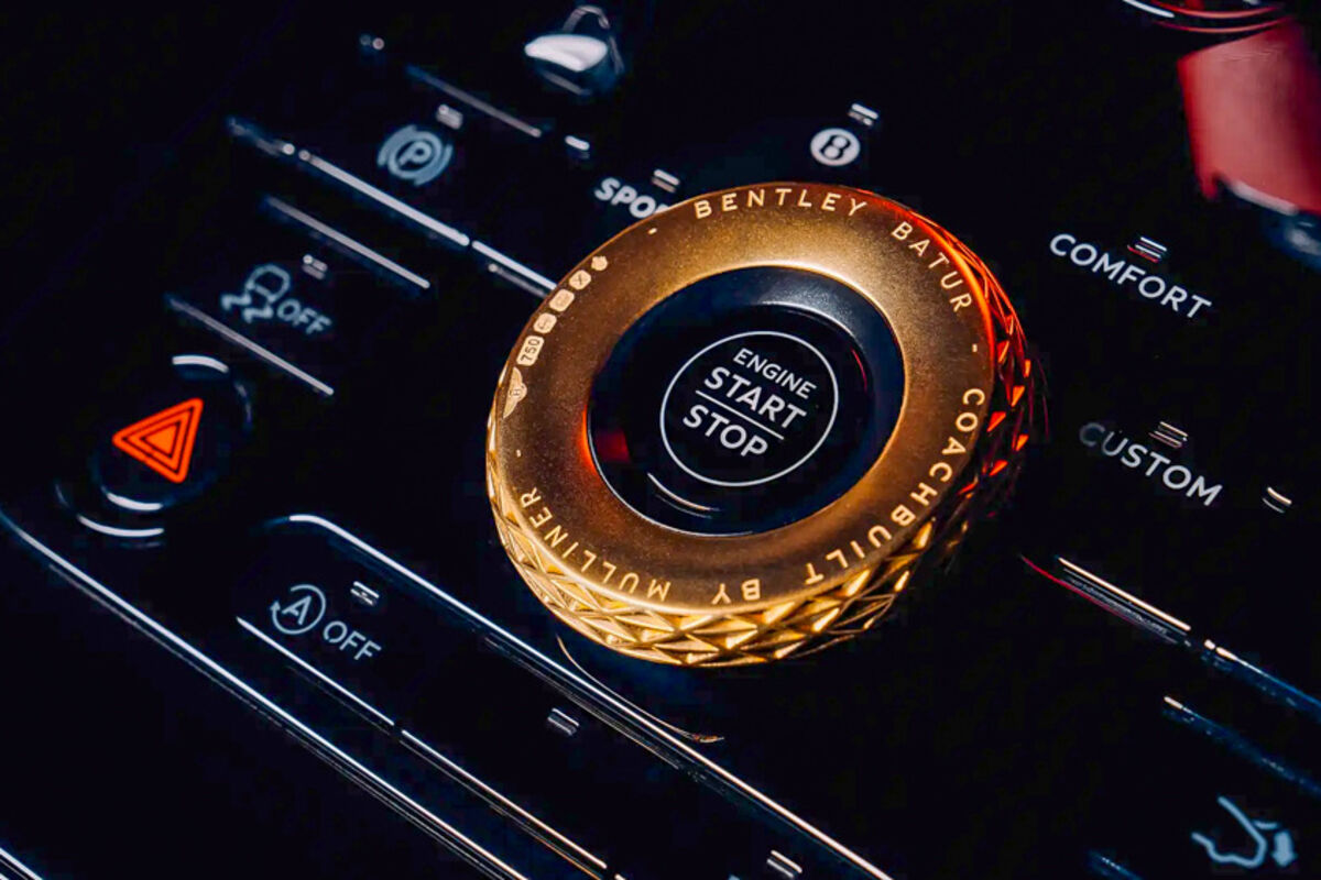 Gold%20inlayed%20into%20the%20Bentley%20Mulliner%20Batur%20start%2Dstop%20button%2E