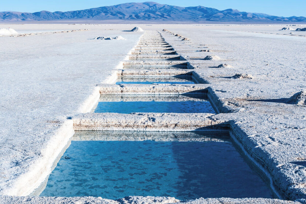A series of square brine-filled holes in the Salinas Grandes salt flats.