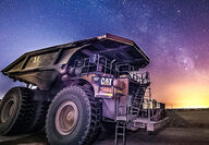 Milky Way lights up the night sky above a mining truck at a Chilean copper mine.