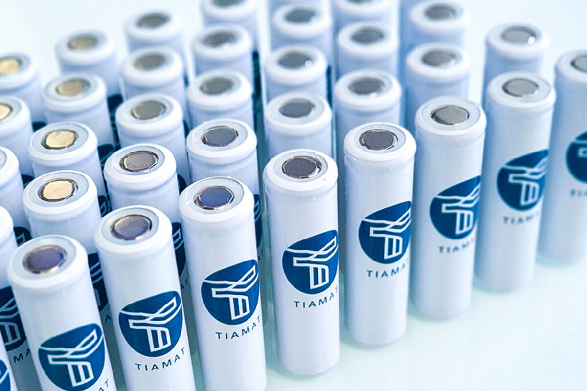 Rows of Tiamat-branded sodium-ion batteries on display.