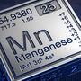 A metallic cube of the periodic table symbol and information for manganese.