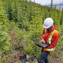 A geoscientist tests for CO2 that could indicate hidden mineralization in BC.