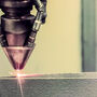 Laser sintering metal into a complex shape, not otherwise possible with casting.