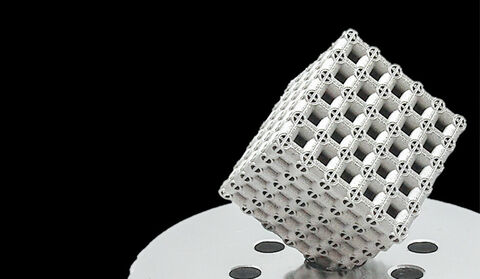 A complex metamaterial metal cube printed using aluminum.