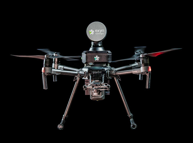Closeup of an Exyn drone equipped with lidar survey equipment.